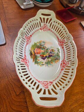 antique German reticulated porcelain serving bowl with courting couple scene